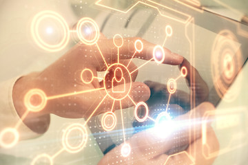 Double exposure of man's hands holding and using a phone and social network theme drawing.