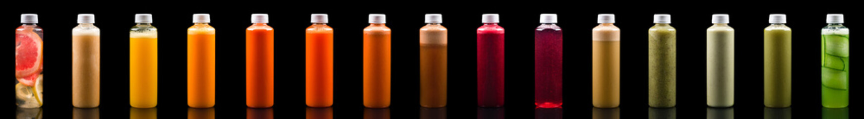 Various fresh vegetable detox juices, colourful smoothies in the bottle set