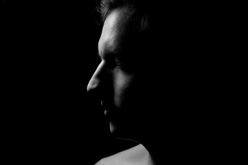 black and white dramatic portrait of a guy