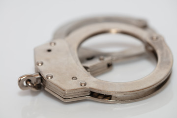 steel metal Handcuffs on  white background isolate