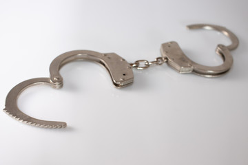 steel metal Handcuffs on  white background isolate