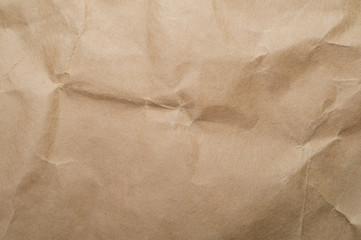 Crumpled parchment. packing paper texture. uneven carton