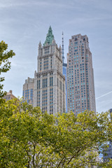 View at The Woolworth Building on Broadway from the Brooklyn Bridge. 1913 neo-Gothic skyscraper, once the world's tallest building and still an architectural landmark