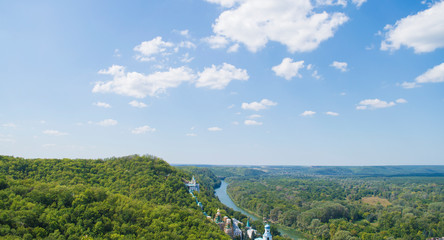 river and temples in the forest against the sky