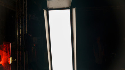 Studio light panel for a movie and TV show on a dark background. Professional light for the...