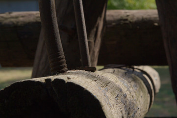 Wooden pole with metal mounts