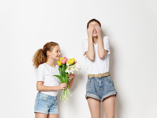 mother and daughter with flowers