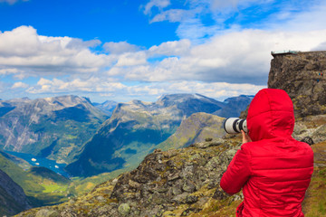 Naklejka premium Tourist taking photo from Dalsnibba area Norway