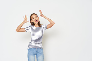 happy young woman with hands up