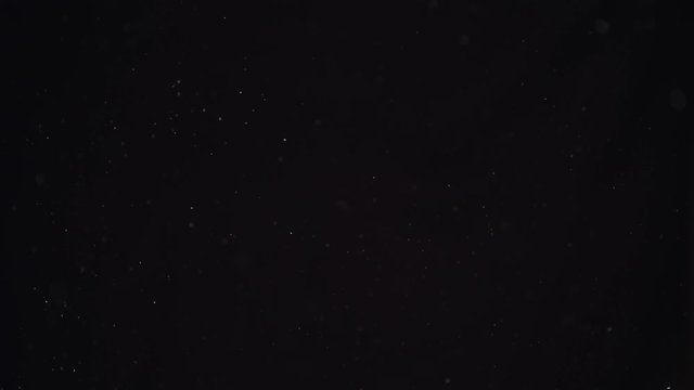 4k Natural Dust Organic Floating particles on black background. Dust in air atmosphere for your projects! Just drop it over your footage and use blending (screen) mode
