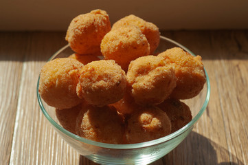 art photo plates with Russian donuts close-up on a wooden background