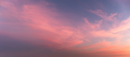 Purple hue pastels gradient sunset background on soft nature sunrise peaceful morning outdoor. heavenly mind view at a resort deck touching sunshine, sky summer clouds.