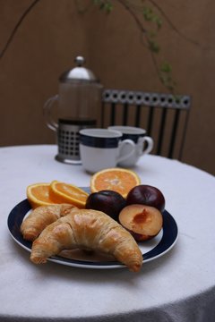 Stay home breakfast coffee plum orange croissant