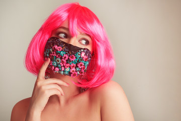 Girl with bright pink hair, anime, in a mask of flowers. Spring, joy, people should wear masks....