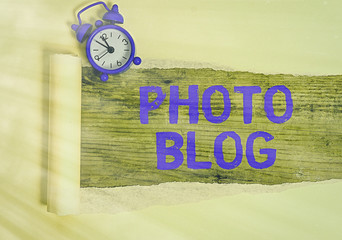 Conceptual hand writing showing Photo Blog. Concept meaning form of photo sharing and publishing in...