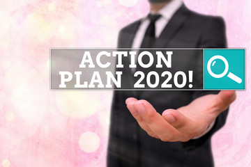 Conceptual hand writing showing Action Plan 2020. Concept meaning proposed strategy or course of...