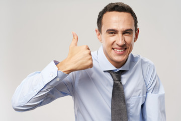 businessman showing his finger up