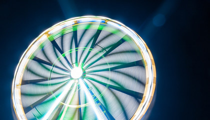 manege grande roue nuit lumière