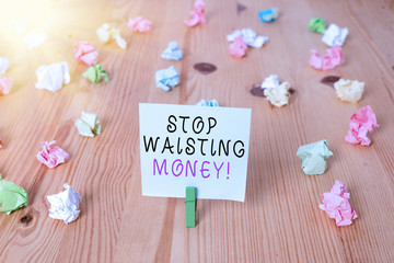 Handwriting text Stop Wasting Money. Conceptual photo advicing demonstrating or group to start...