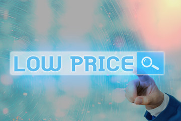 Writing note showing Low Price. Business concept for Price are the lowest in relation to other...