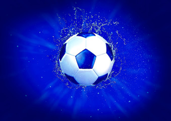 Fototapeta premium Rozpryskiwania piłki nożnej