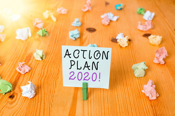 Handwriting text Action Plan 2020. Conceptual photo proposed strategy or course of actions for...