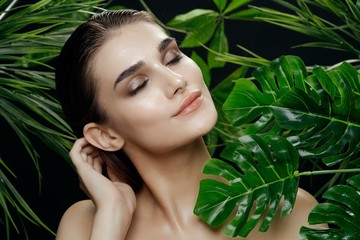 beautiful women naked shoulders green leaves Exotic tropics