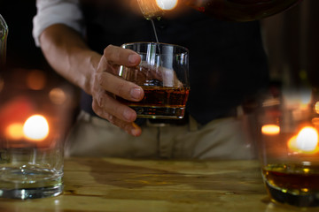 Bartender Serve Whiskey, on wood bar,