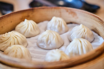 Fototapeta na wymiar Fresh made steamed dumplings in asian restaurant in Sydney
