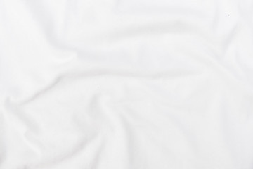 Abstract white fabric texture background. Wavy white cloth.