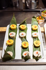 Rice and corn chinese snacks on bamboo leaves in Chengdu, Sichuan province, China