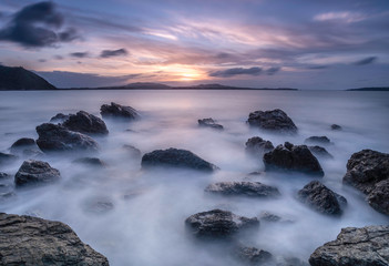 Long exposure of waves crashing over rocks in Okinawa, Japan.