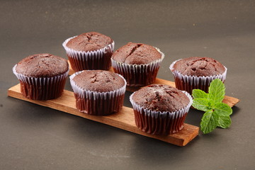Vegan diet  food-  fresh baked chocolate muffins . healthy snack food background