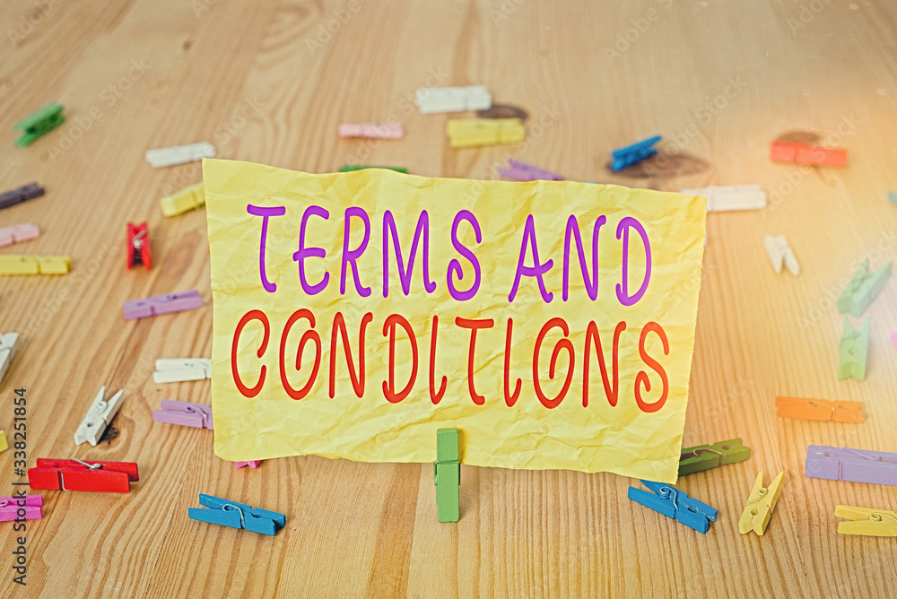 Aufkleber writing note showing terms and conditions. business concept for rules that apply to fulfilling a par