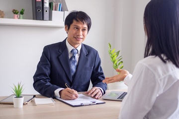 Executives sitting job interview with female applicants .Applying for new job, career opportunity, concept executive management or recruitment representative interviews.