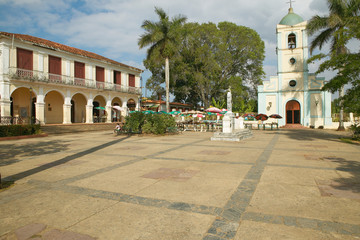 Fototapeta na wymiar Small village in central Cuba with Catholic Church