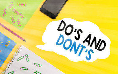 Conceptual hand writing showing Do S And Dont S. Concept meaning Rules or customs concerning some...