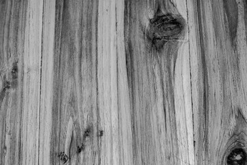 wood black background. Wood Dark background texture. Blank for design. Background from black wooden vertical boards close-up. Wooden monochrome boards, texture for design. Black vignette, natural wood