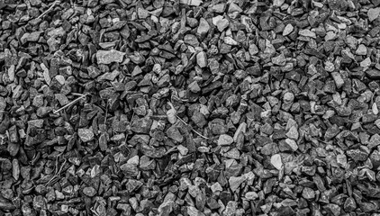 Stone grain background. black and white rough cement wall texture with cracks, a background pattern. 