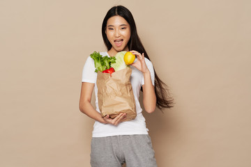 young woman with shopping bag