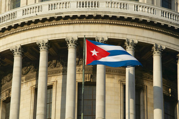 The Capitolio and Cuban Flag, the Cuban capitol building and dome in Havana, Cuba