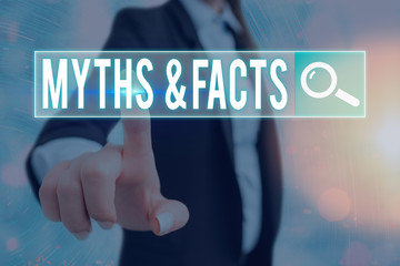 Writing note showing Myths And Facts. Business concept for usually traditional story of ostensibly...