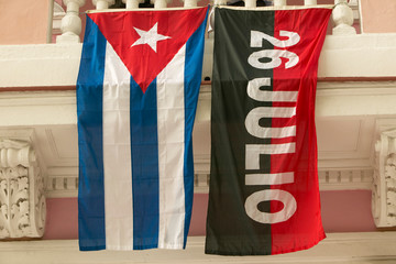 26 July flag and Cuban flag, Havana, Cuba