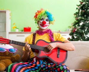 Funny clown in Christmas celebration concept