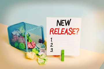 Conceptual hand writing showing New Release Question. Concept meaning asking about recent product...