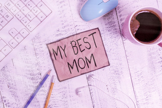 Writing note showing My Best Mom. Business concept for Appreciation for your mother s is love feelings compliment Technological devices colored reminder paper office supplies
