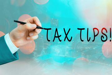 Conceptual hand writing showing Tax Tips. Concept meaning compulsory contribution to state revenue...