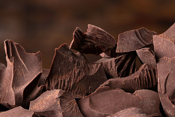 heap pieces chocolate, sweet dessert of dark bars