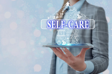 Conceptual hand writing showing Self Care. Concept meaning the practice of taking action to improve...