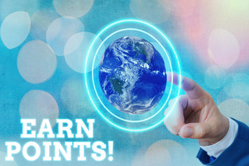 Writing note showing Earn Points. Business concept for collecting scores in order qualify to win...